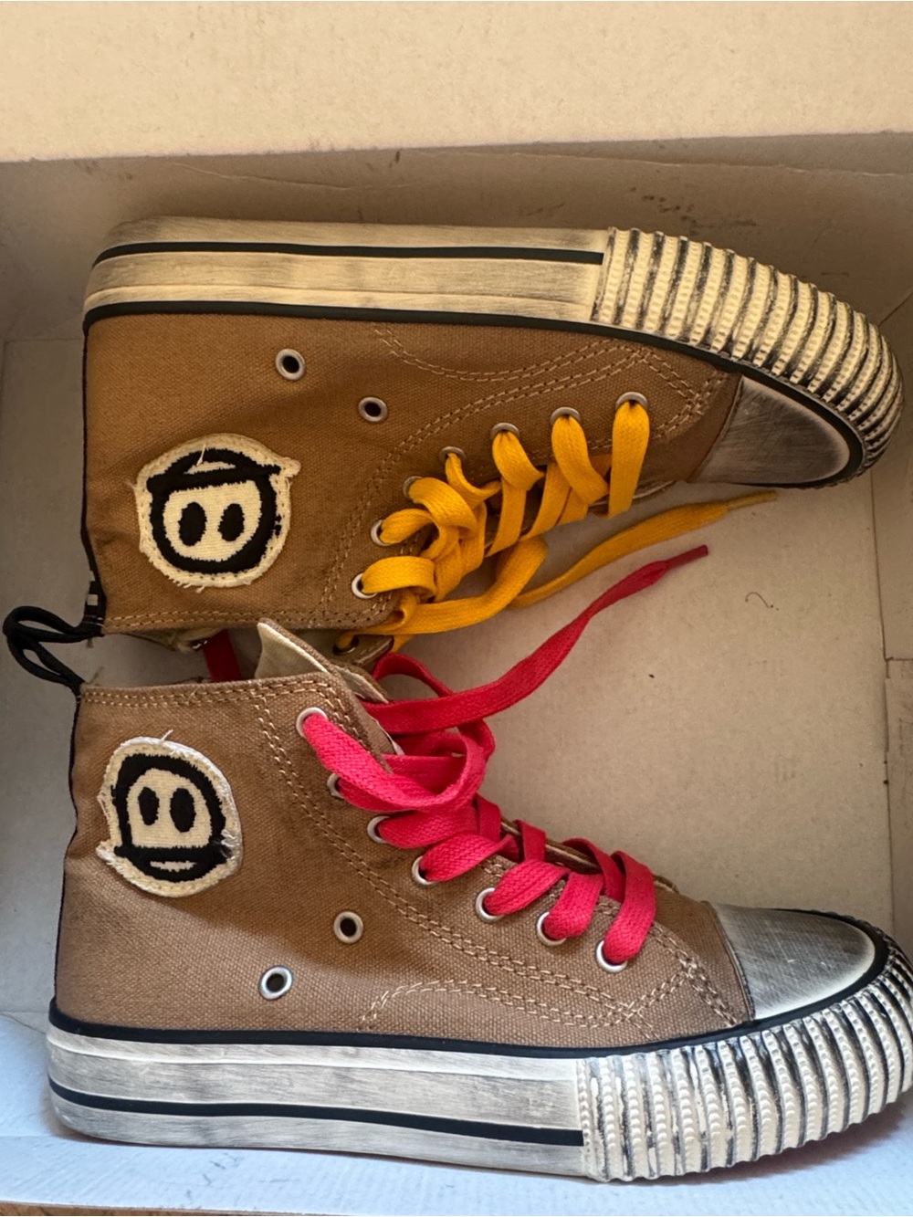 Nununu distressed high tops